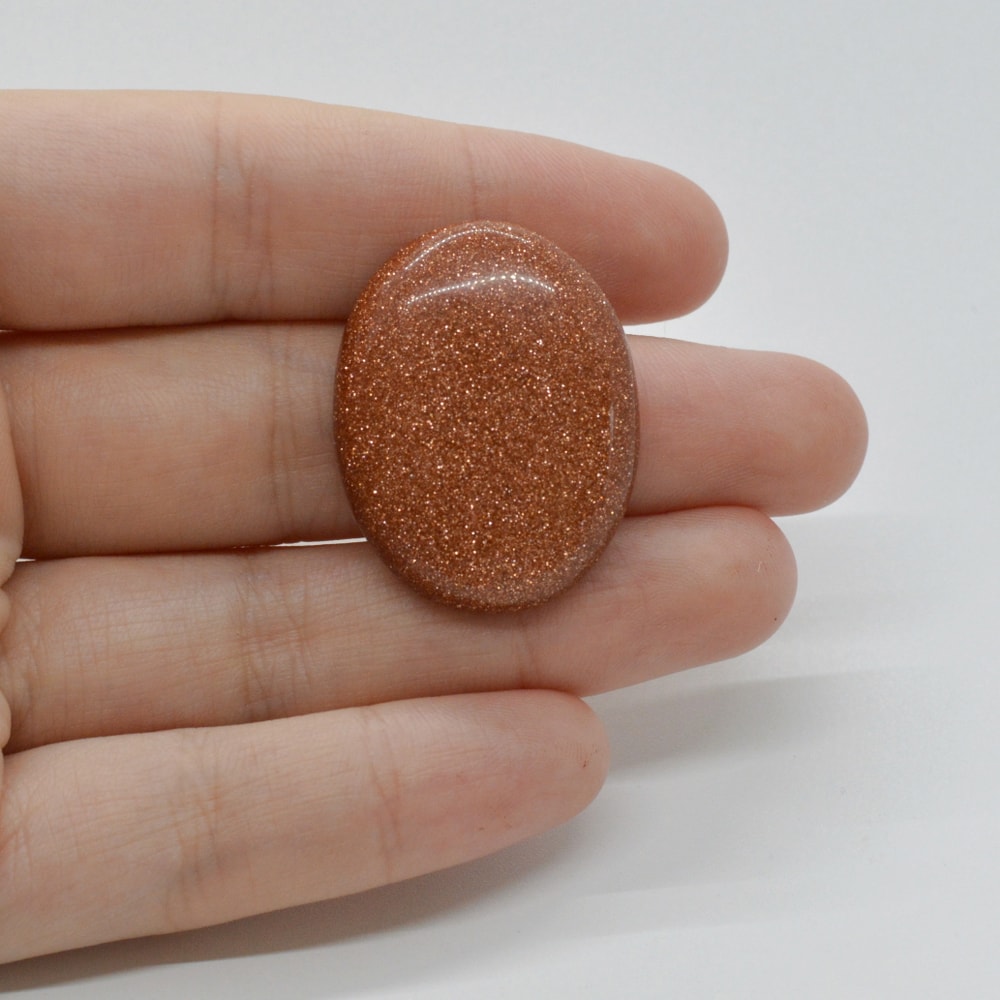 Cabochon goldstone maro 31x24x6mm c108