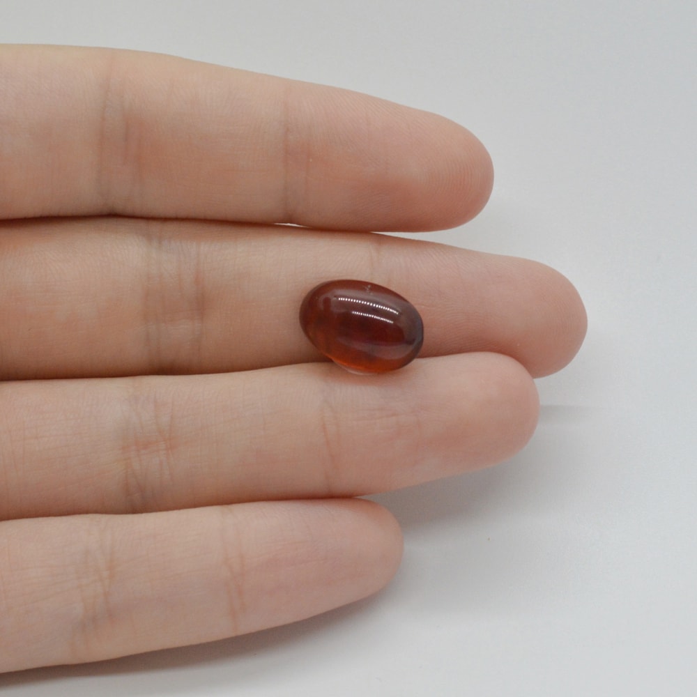 Cabochon granat hessonit 14x9x5mm c200