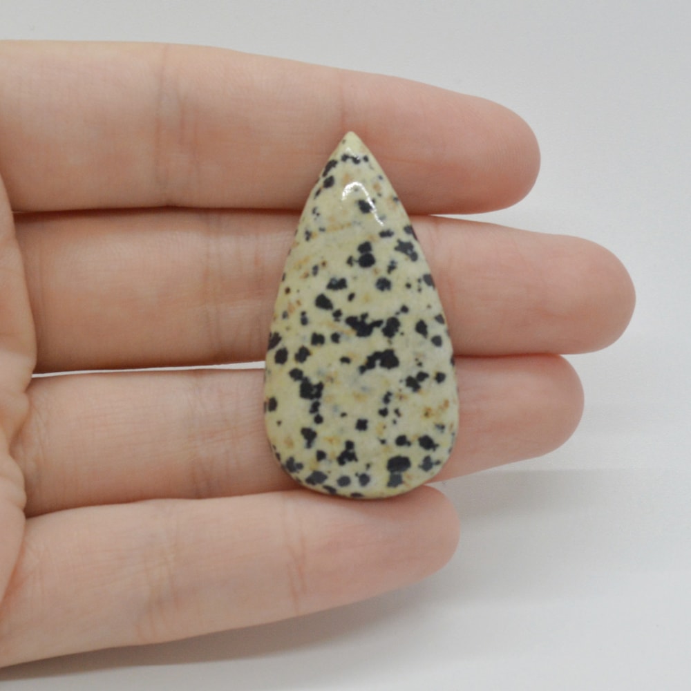 Cabochon jasp dalmatian 40x21x6mm c44