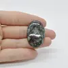Cabochon Eudialit 37x23x7mm C54