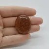 Cabochon Goldstone Maro 33x27x6mm C26