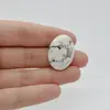 Cabochon Magnezit 26x19x4mm C87