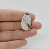 Cabochon Magnezit 31x18x5mm C65