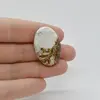 Cabochon Magnezit 31x21x5mm C39