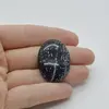 Cabochon Obsidian Fulg de nea 33x24x7mm C54