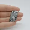 Cabochon Pinolith 34x19x5mm C6