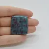 Cabochon Rubin in kianit 33x29x5mm C3
