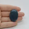 Cabochon Rubin in kianit 36x25x5mm C6