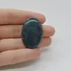 Cabochon Rubin in kianit 36x25x6mm C15