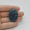 Cabochon Rubin in kianit 37x27x5mm C21