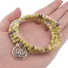 Bratara tripla ajustabila cu cristale naturale Jad olive sfere 4mm cu charm floare de lotus argintiu, imagine 4