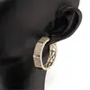 Cercei din cupru placat cu aur galben 18k model hexagonal cu zirconiu, imagine 3