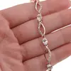 Bratara din cupru placat cu aur roz 18k cu elemente din zirconiu alb, model curbat, imagine 3
