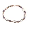 Bratara din cupru placat cu aur roz 18k cu elemente din zirconiu violet, model curbat