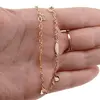 Bratara pentru glezna din cupru placat cu aur 18k cu clopotel, model banuti, imagine 3