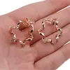 Cercei cu surub din cupru placat cu aur roz 18k model floare cu zirconii, 23mm, imagine 4