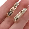 Cercei din cupru placat cu aur galben 18k model bucla cu zirconiu, 25mm, imagine 4