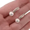 Cercei din cupru placat cu aur roz 18k cu perla si trei randuri de zirconii, 21mm, imagine 4