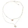 Lant dublu din inox placat cu aur galben 18k, pandantiv fluturi