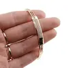 Bratara din cupru placat cu aur galben 18k fixa cu zirconii incrustate central, imagine 4