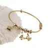 Bratara din cupru placat cu aur galben 18k fixa, model snake cu charm fluturasi, imagine 3