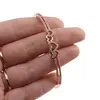 Bratara din cupru placat cu aur roz 18k fixa pe doua randuri cu inimioare si zirconii, imagine 4