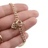 Bratara din cupru placat cu aur galben 18k, model zale rasucite si lacat, imagine 3