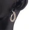 Cercei din cupru placat cu aur galben 14k model oval cu zirconii, imagine 2