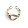 Inel reglabil Cupru placat cu Aur galben 14k, model impletit cu zirconiu, imagine 2
