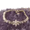 Bratara din cupru placat cu aur galben 18k, model inimi si floare centrala, imagine 2
