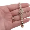 Bratara din cupru placat cu aur galben 18k, model inimi si floare centrala, imagine 3
