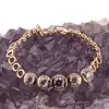 Bratara din cupru placat cu aur roz 18k, model cercuri cu zirconii multicolore, imagine 2