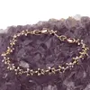 Bratara din cupru placat cu aur roz 18k, model flori cu zirconii negre, imagine 2