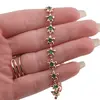 Bratara din cupru placat cu aur roz 18k, model flori cu zirconii verzi, imagine 3