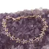 Bratara din cupru placat cu aur roz 18k, model flori cu zirconii violet, imagine 2