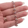 Bratara din cupru placat cu aur roz 18k, model flori cu zirconii violet, imagine 3