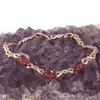 Bratara din cupru placat cu aur roz 18k, model impletit cu zirconii rosii, imagine 2