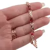 Bratara din cupru placat cu aur roz 18k, model impletit cu zirconii rosii, imagine 3