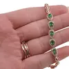 Bratara din cupru placat cu aur roz 18k, model picatura cu zirconii verzi, imagine 3