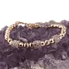 Bratara din cupru placat cu aur roz 18k, model sfere fatetate si charmuri cu zirconiu, imagine 2