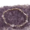 Bratara din cupru placat cu aur roz 18k, model zale alungite si zirconii, imagine 2