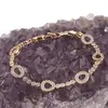 Bratara din cupru placat cu aur roz 18k, model zirconii ovale si rotunde, imagine 2