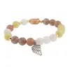 Bratara cristale naturale Arhanghelul Auriel cu bumbi aurii pe elastic, imagine 2