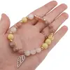 Bratara cristale naturale Arhanghelul Auriel cu bumbi aurii pe elastic, imagine 3