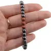 Bratara pe elastic Hematit si Goldstone maro, 6mm, imagine 3