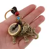Breloc Feng Shui Amuleta cu nod mistic si elefant cu monede chinezesti, 10cm, imagine 2