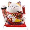 Pisica norocoasa Maneki Neko din ceramica pe perna cu patru pui si barca cu pepite - 21cm