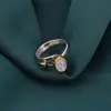 Inel din argint 925 reglabil, model deschis cu Piatra lunii si Onix verde cu elemente aurii, imagine 4