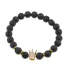 Bratara pe elastic Roca Vulcanica sfere 8mm cu element auriu coroana