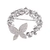 Brosa argintie rotunda cu fluture si zirconii, 40mm